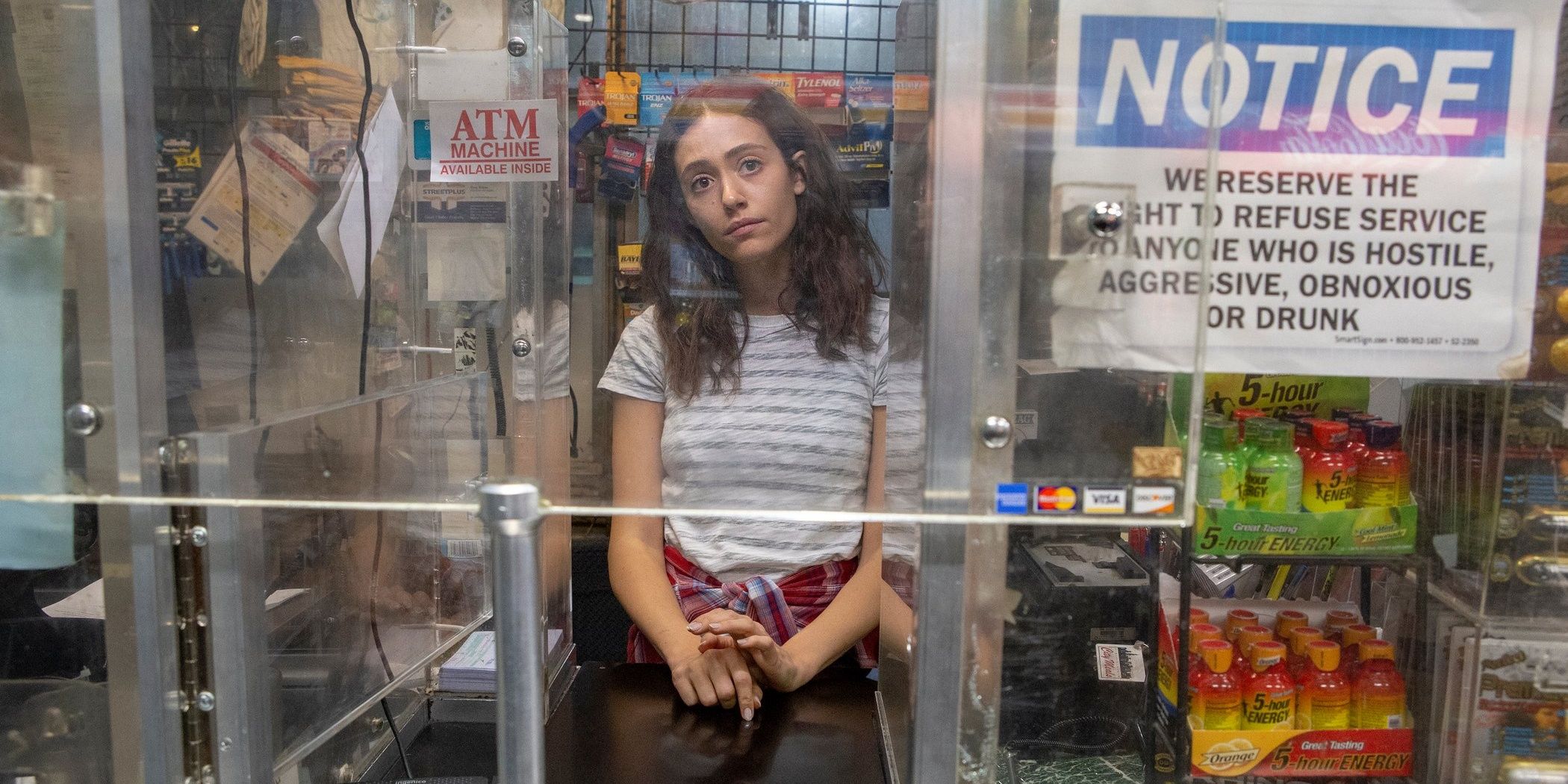 Fiona Gallagher mans the desk of a gas station convenience store in Shameless