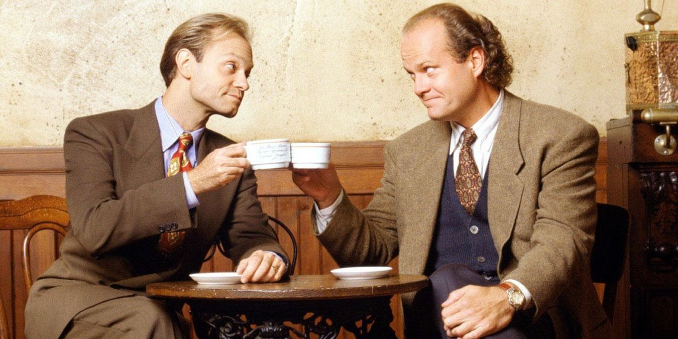 Frasier and Niles toast with two cups of coffee
