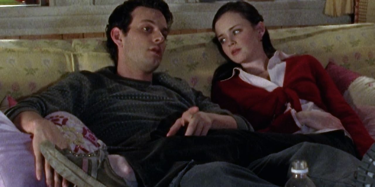 Gilmore Girls' Rory sitting on couch with Marty