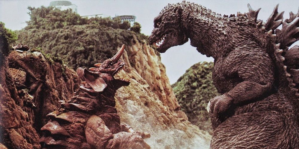 Baragon battles Godzilla in Godzilla Mothra and King Ghidorah: Giant Monsters All Out Attack 2001