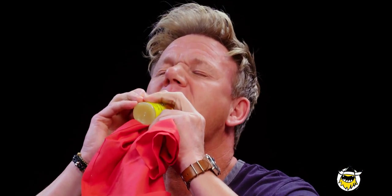 Gordon Ramsay squirting lemonjuice into his mouth on Hot Ones