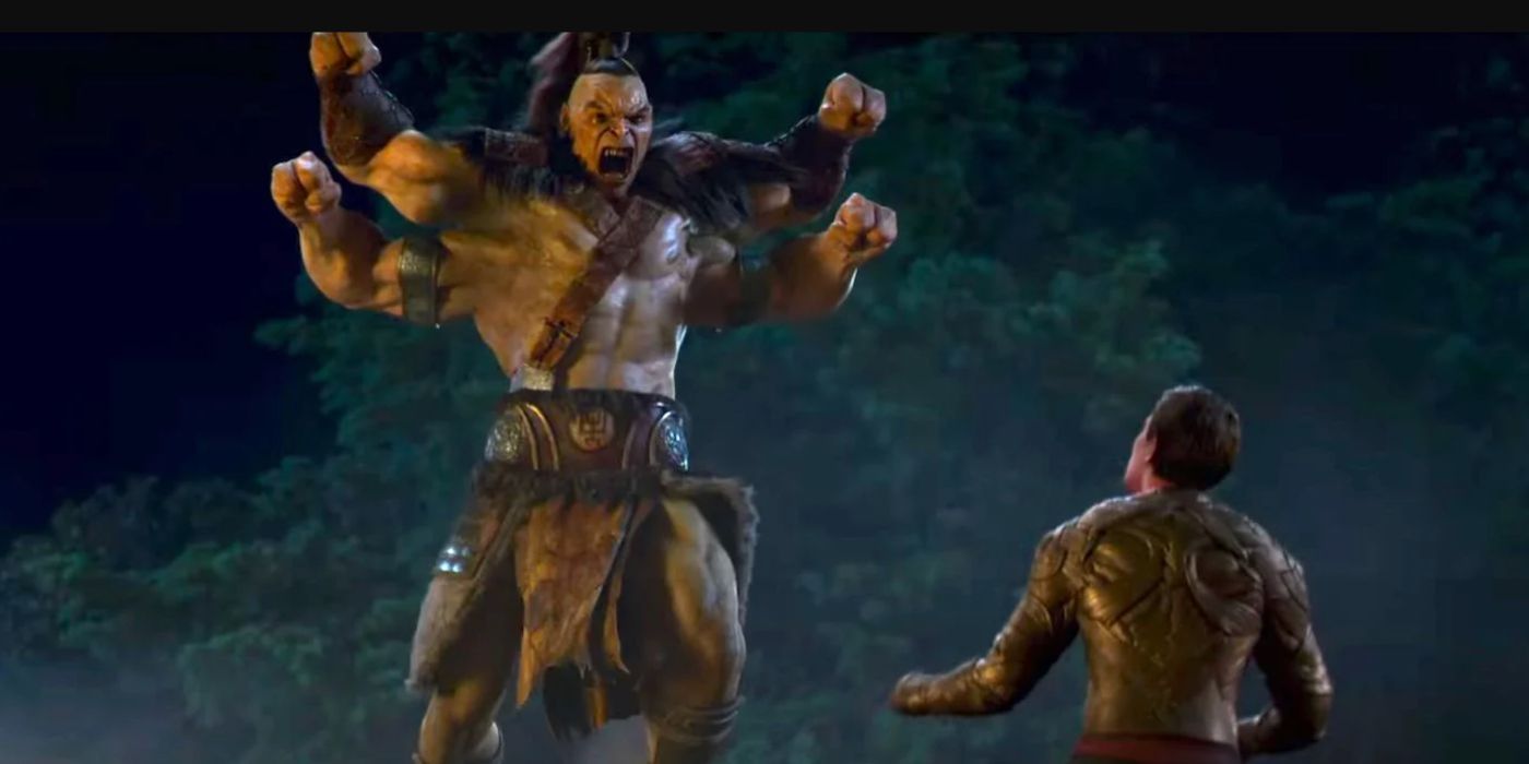 Goro leaps onto Cole in Mortal Kombat.