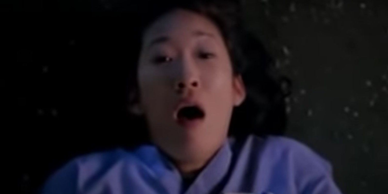 Cristina in Grey's Anatomy gasping on ground after icicle pierces her abdomen.