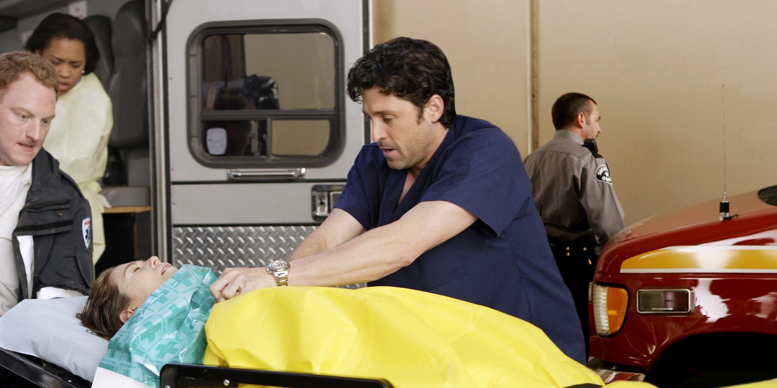 Meredith getting lifted into the back of an ambulance in Grey's Anatomy.