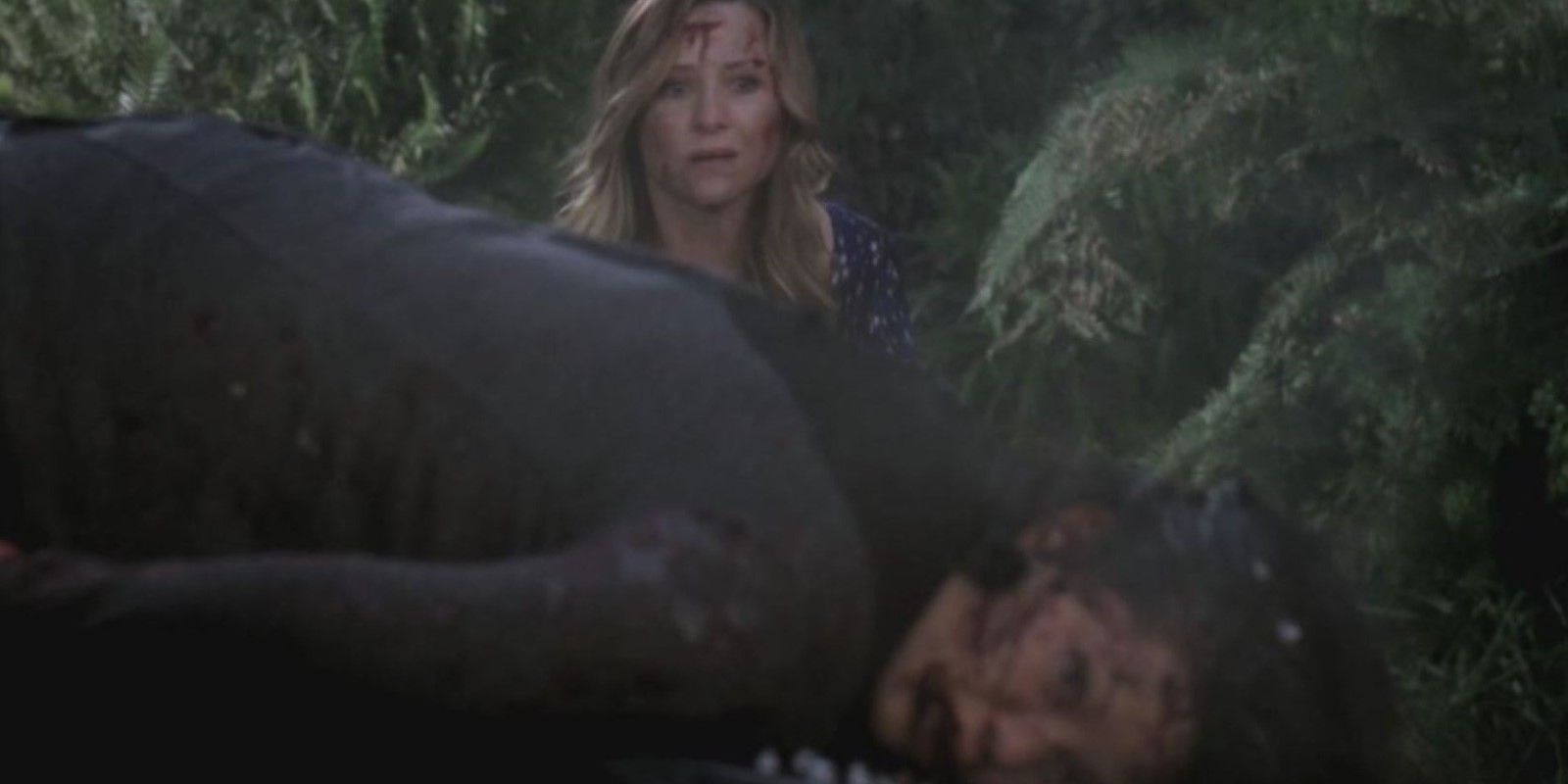 Callie on the ground in Grey's Anatomy after car crash.