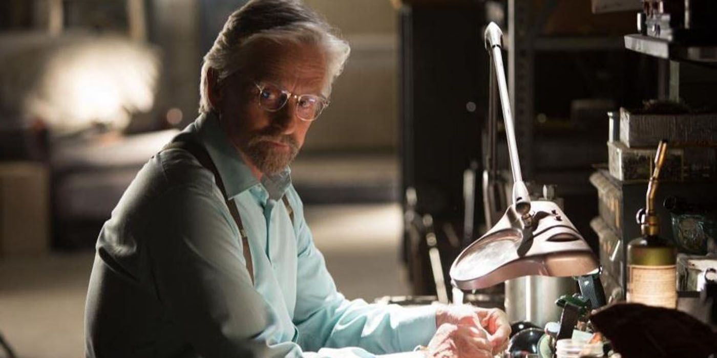 Hank Pym sitting at his table working on something.
