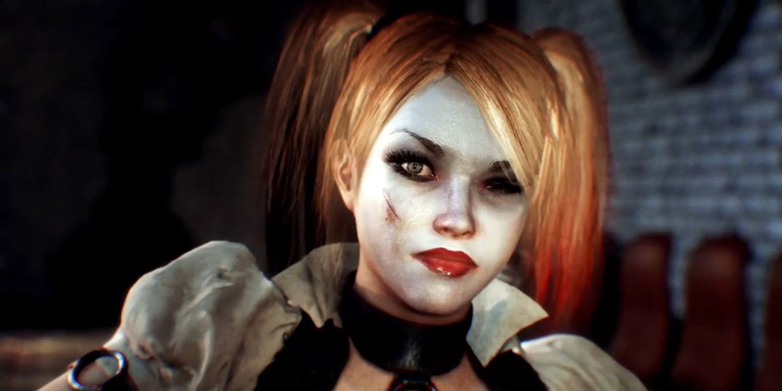 A screenshot showing Harley Quinn winking at the camera in Batman: Arkham Knight.
