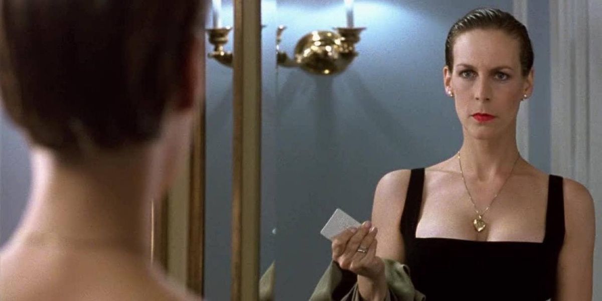 Helen undercover as Michelle in black dress in True Lies