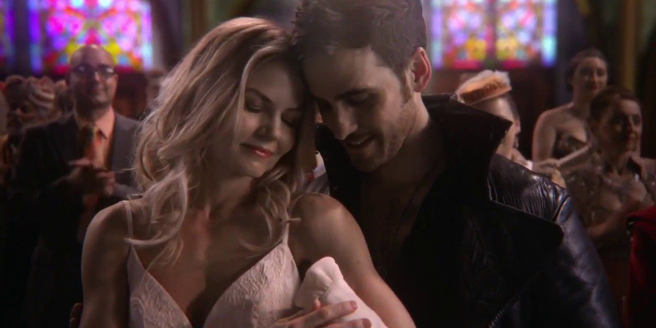 Hook and Emma with their baby.