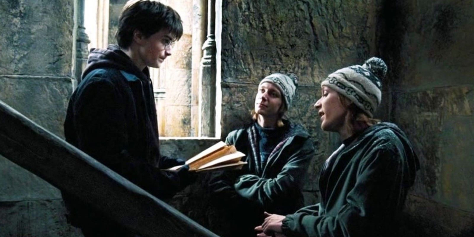 Fred and George giving Harry the Marauder's Map