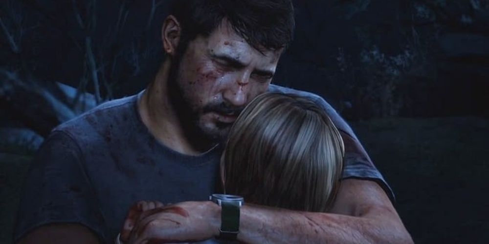 Joel holds his dead daughter and cries in The Last of Us Cropped 1
