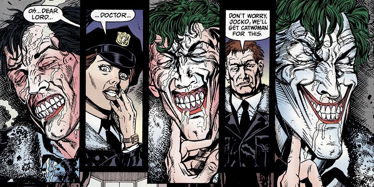 Joker lies on the ground after being assaulted by Catwoman