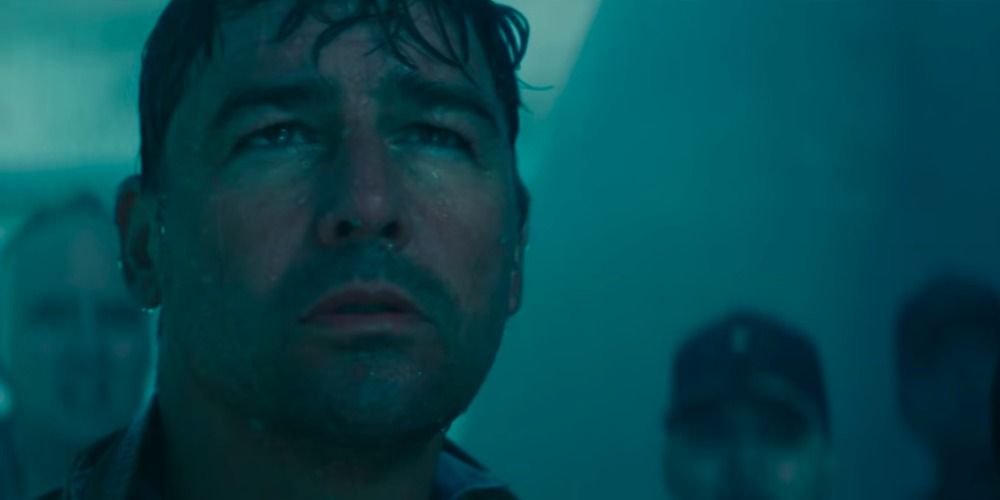 Kyle Chandler as Dr. Mark Russell looking up Godzilla from the submarine in Godzilla King of the Monsters