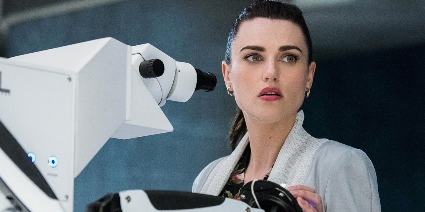 Lena Luthor sitting at her microscope in Supergirl
