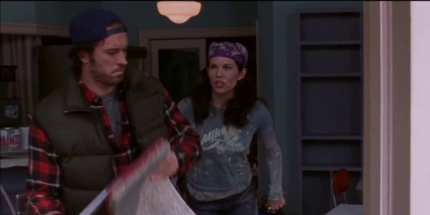 Lorelai helps Luke paint his diner in Gilmore Girls