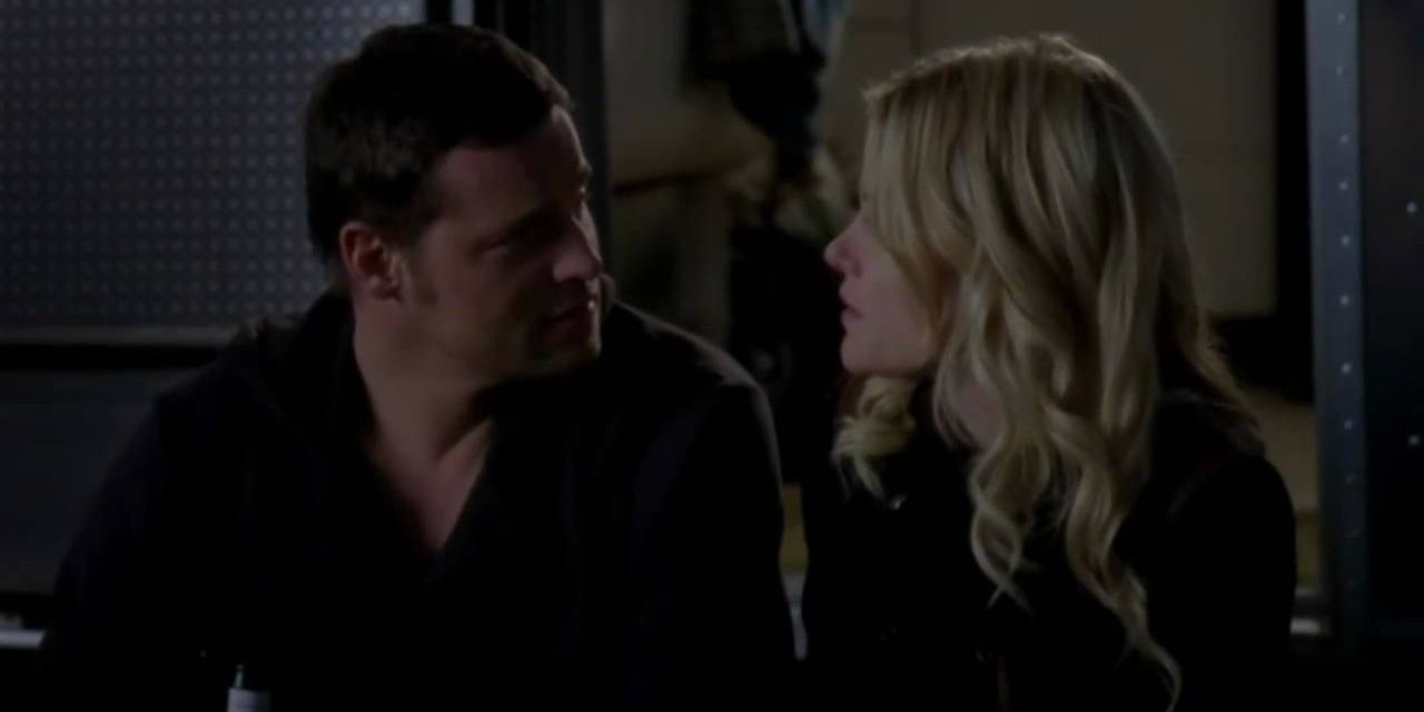 Lucy and Alex have drinks inside Alex&rsquo;s trailer
