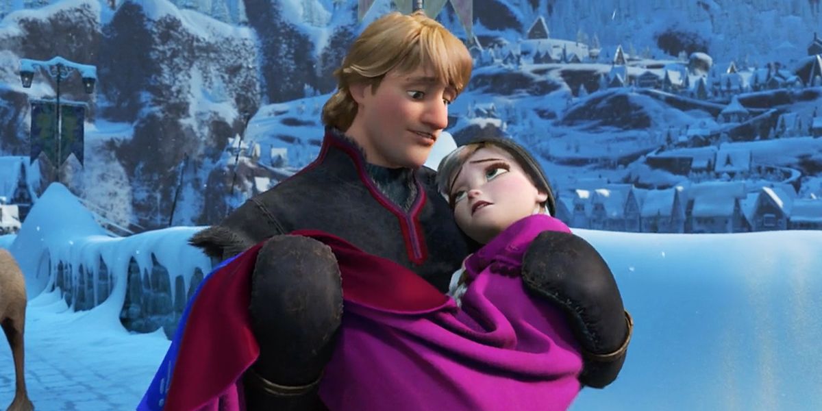 Kristoff holding a weary Anna in his in Frozen