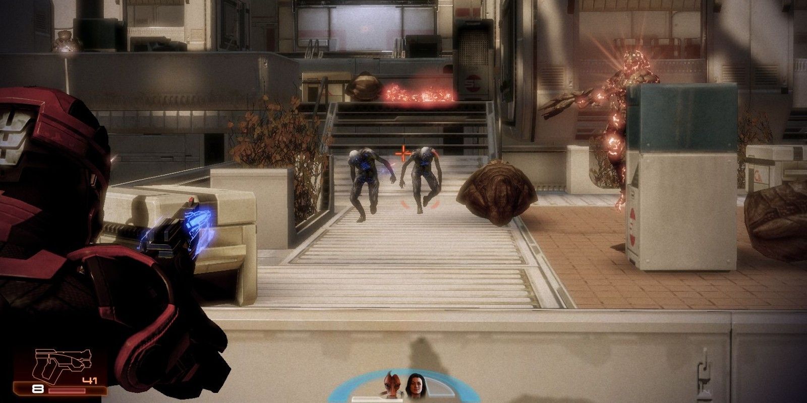 Shepard fights husks in Mass Effect 2