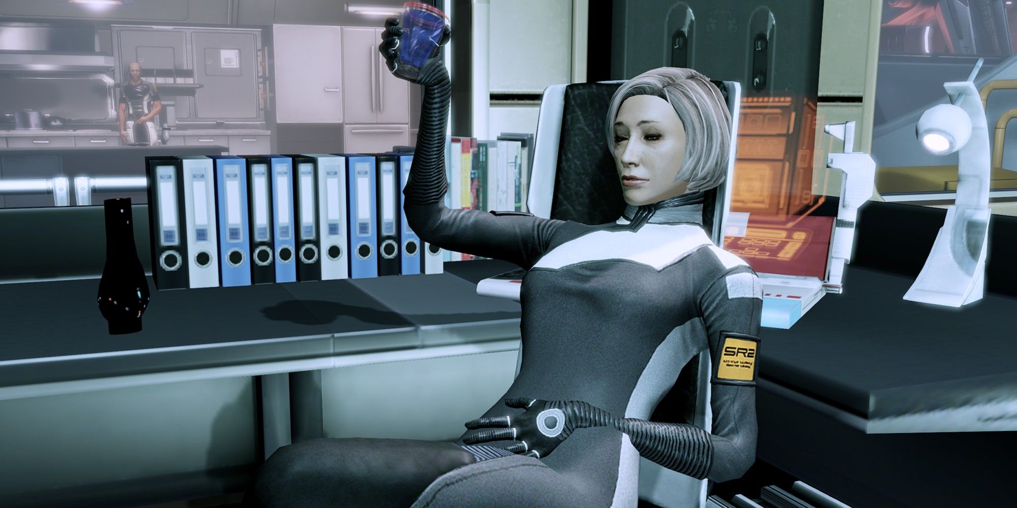 Dr. Chakwas toasts with Shepard in Medical on the Normandy in Mass Effect 2