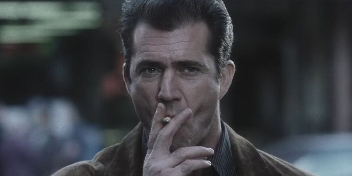 Mel Gibson smoking a cigarette in Payback