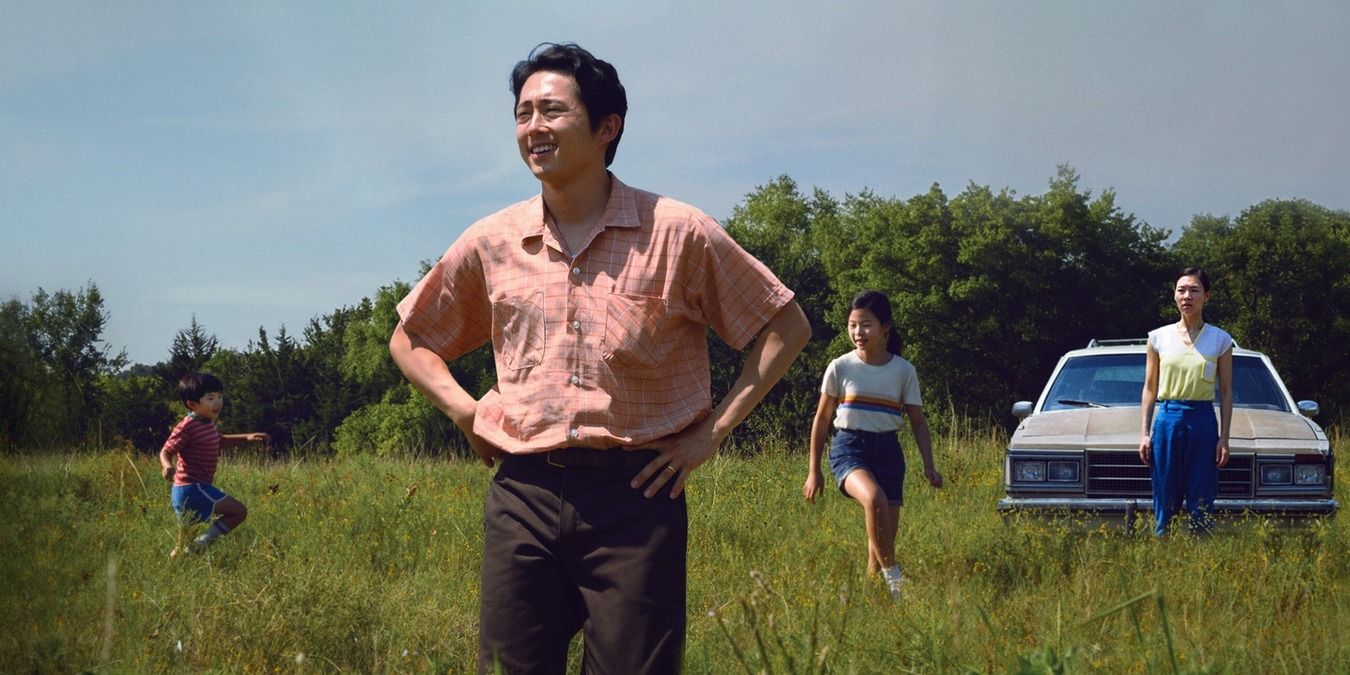 The Yi family walking through the field of their farm