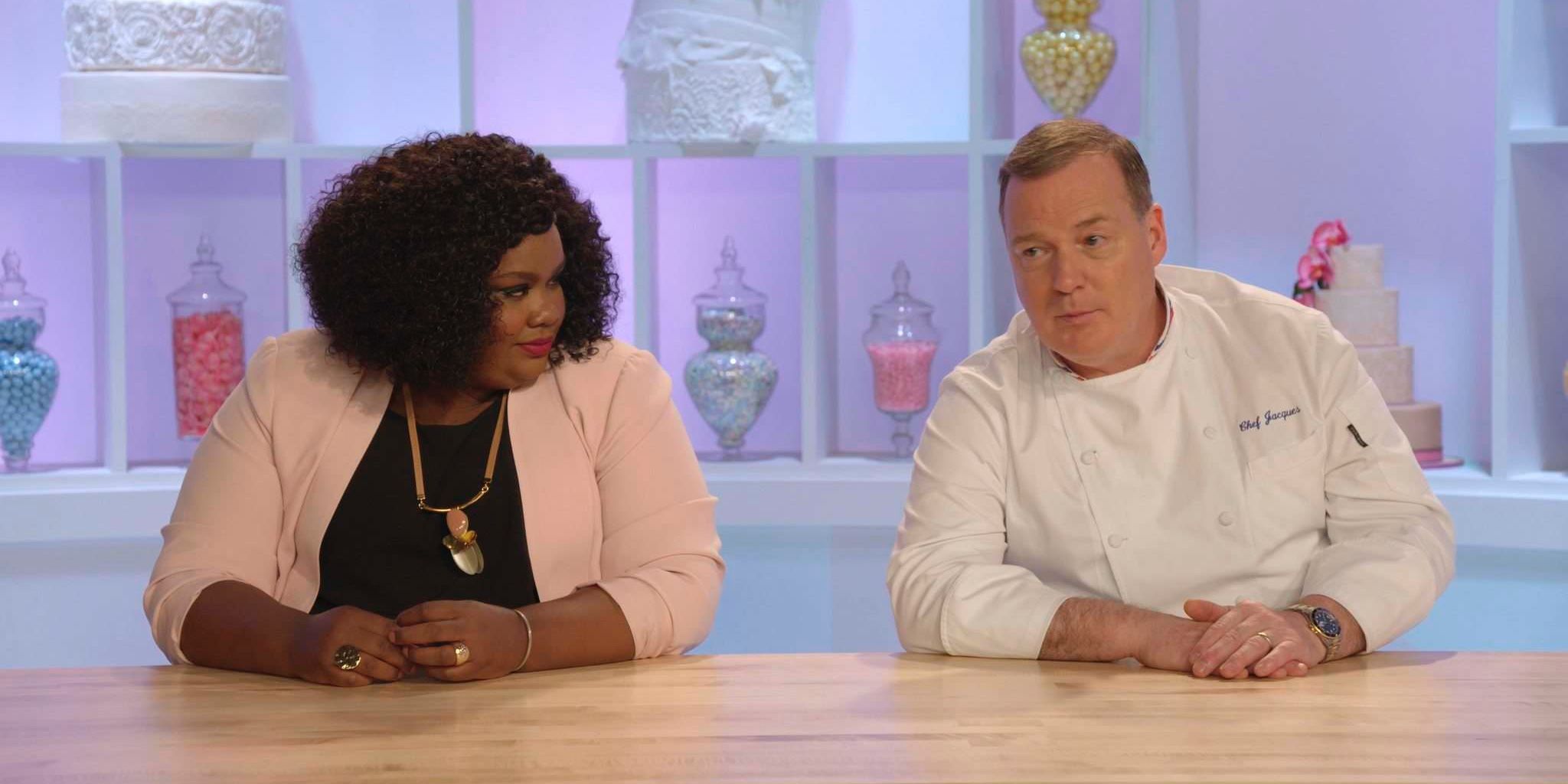 Nicole Byer and Jacques Torres sitting together in Nailed In!