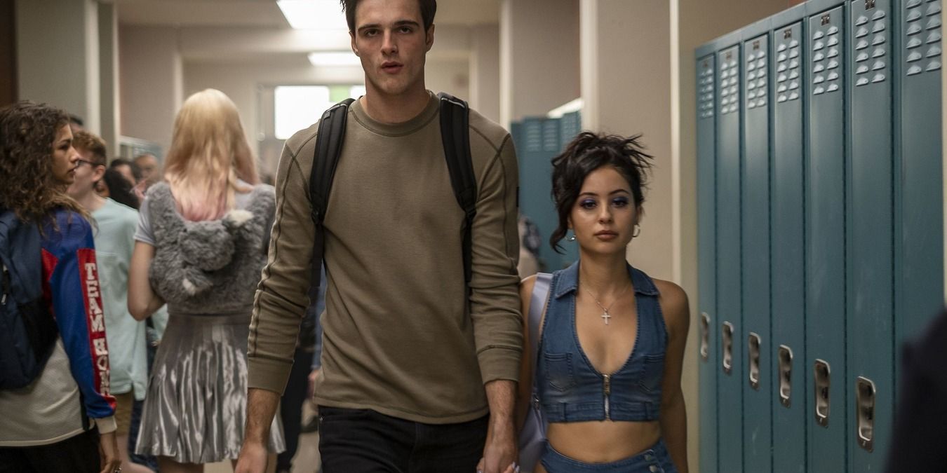 Nate and Maddy walking down the school hallway, holding hands in Euphoria