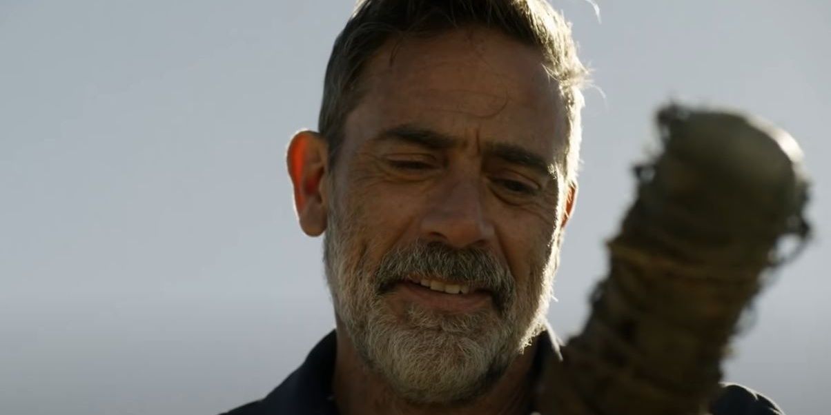 Negan smiles in relief when he finds Lucille the bat in The Walking Dead