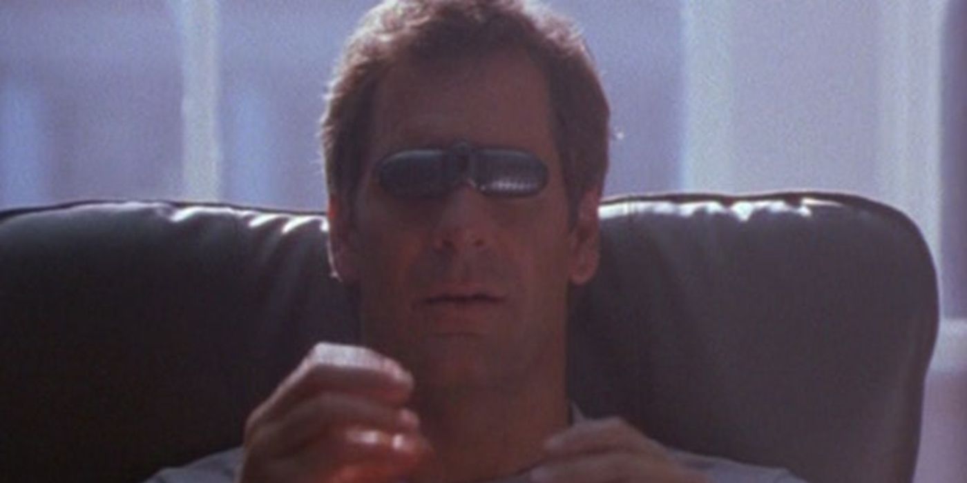 Scott Bakula as Alex Michaels with a device over his eyes in Neoforce