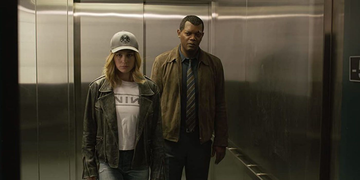 Nick Fury and Captain Marvel in an elevator.