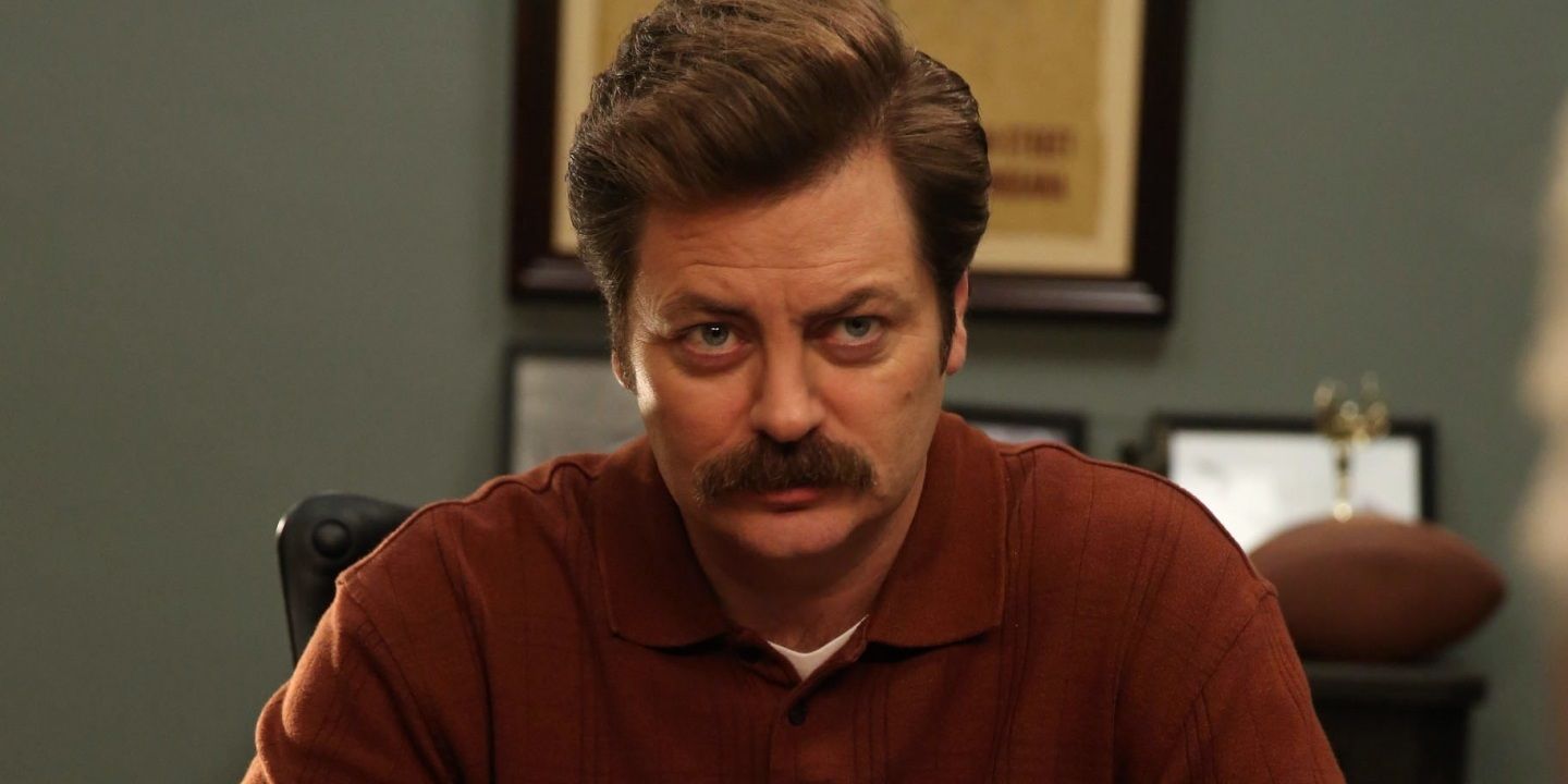 Ron Swanson looking into the camera with a serious expression in Parks and Recreation
