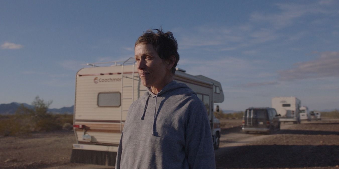 Nomadland Frances McDormand as Fern, standing beside her trailer
