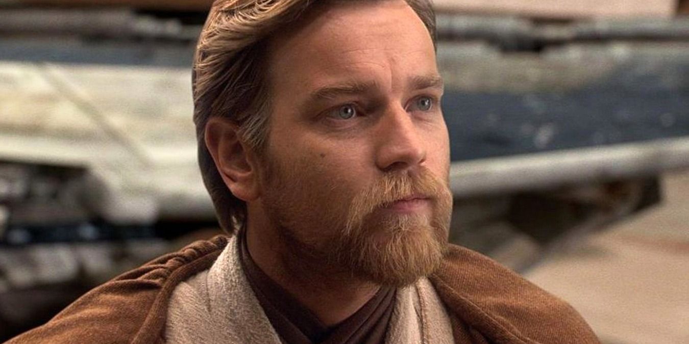 Obi Wan Kenobi in his robe standing beside a ship