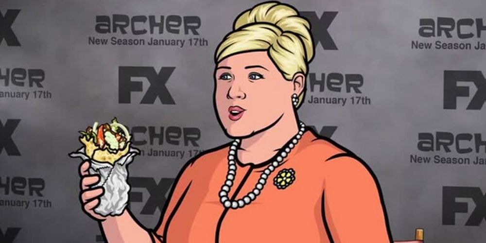 Pam eating a burrito.