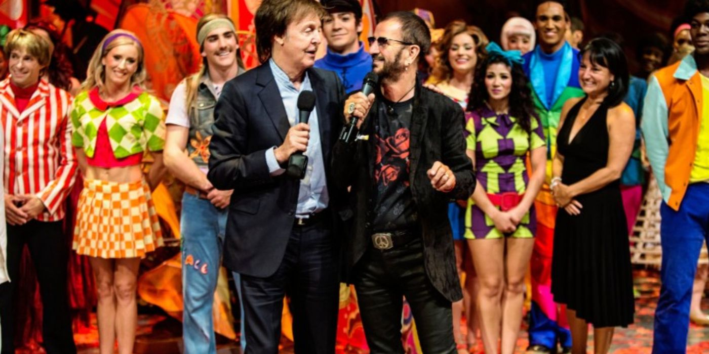 Paul McCartney and Ringo Starr on stage during a performance of Love, a still from All Together Now