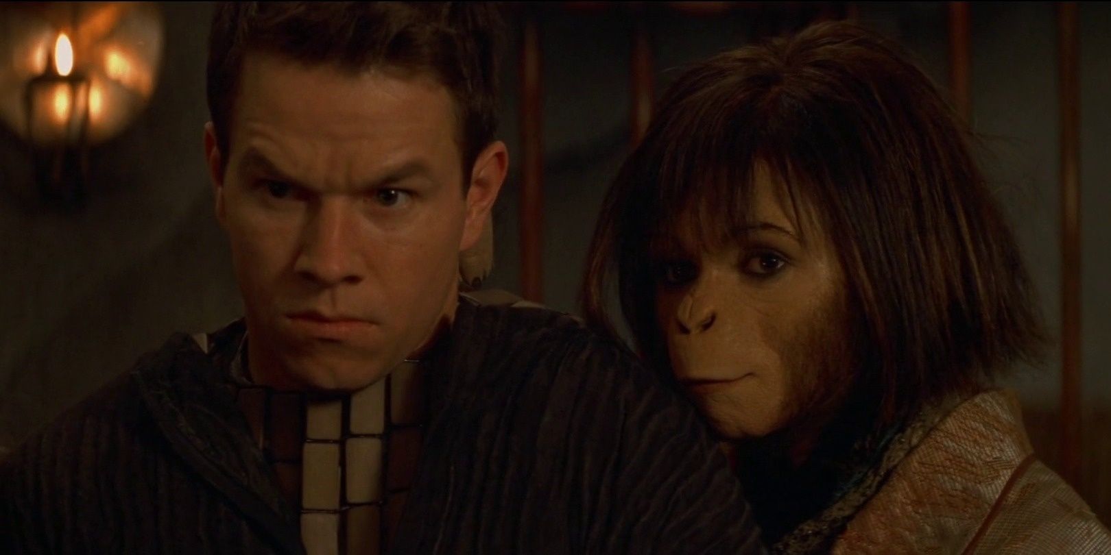 Mark Whalberg as Leo standing with Helena Bonham Carter as Ari in Planet Of The Apes