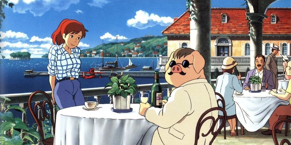 Porco Rosso sits at a dinner table in Porco Rosso.