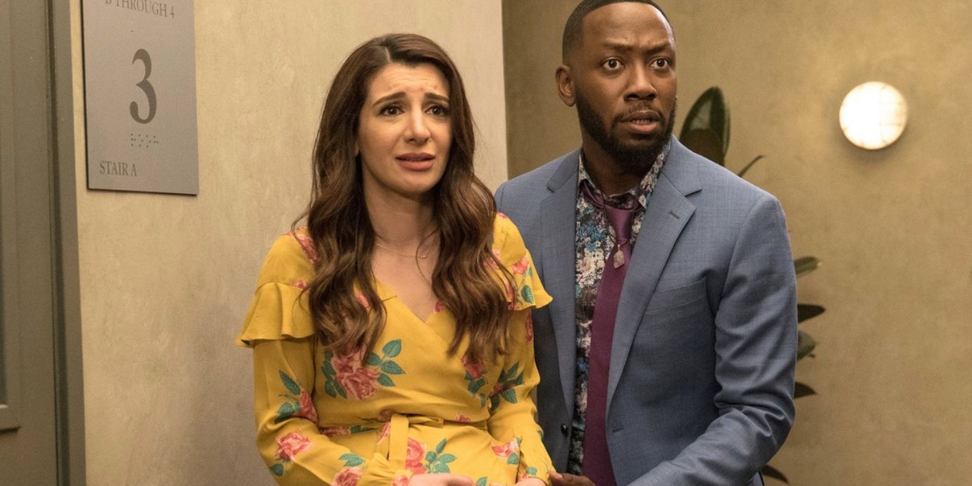 A pregnant Aly stands alongside Winston in New Girl