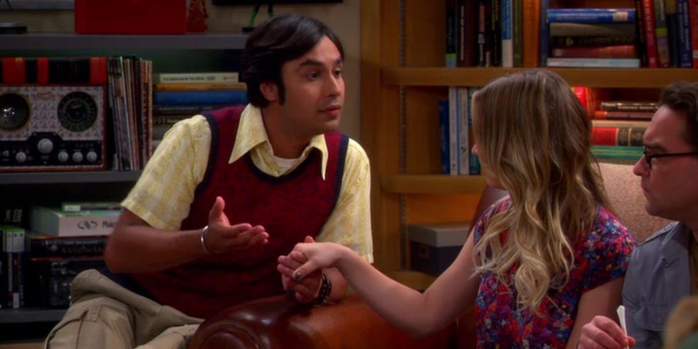 Raj holds Penny's hand as he talks to her in The Big Bang Theory