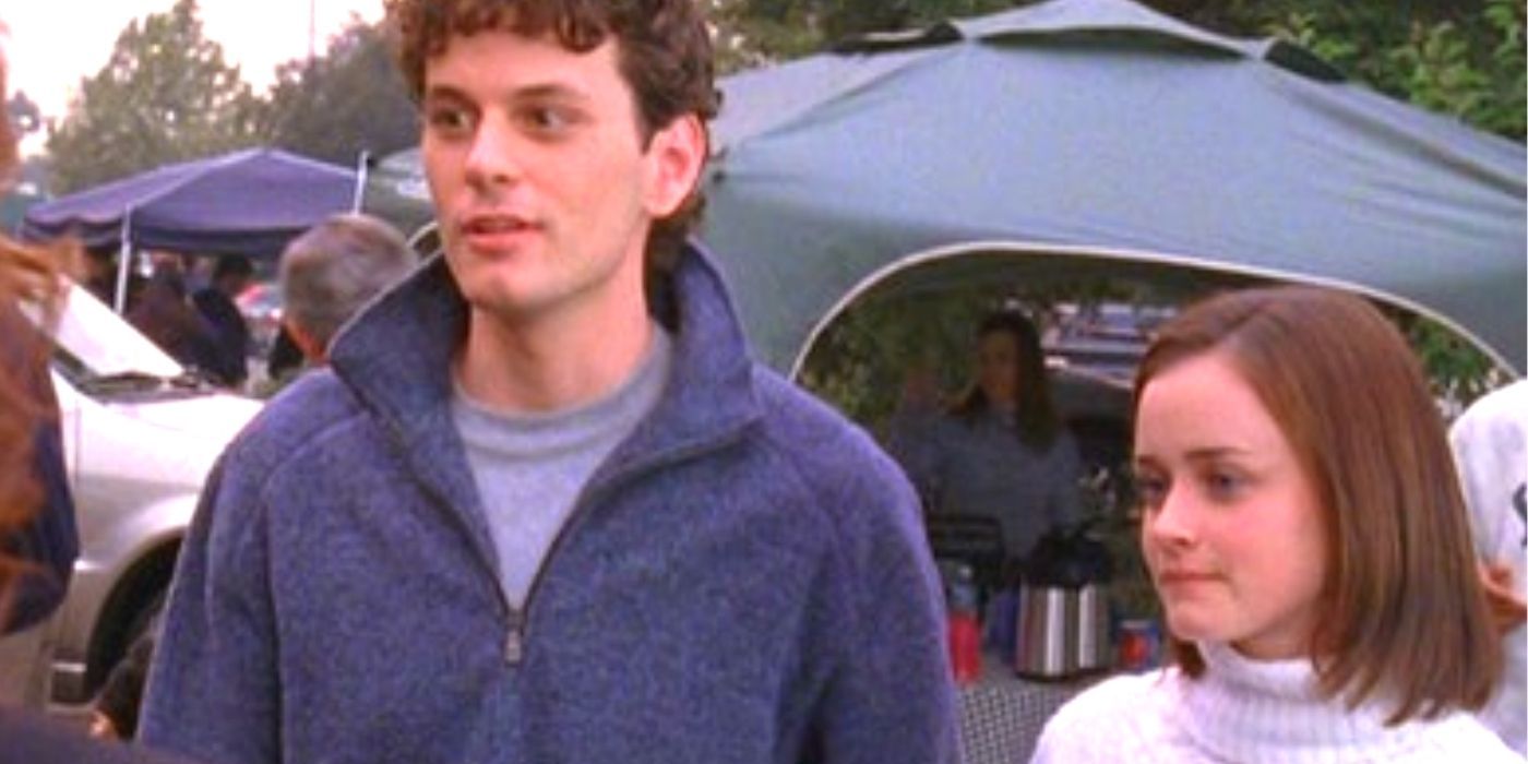Marty and Rory standing outside at a Yale football game on Gilmore Girls