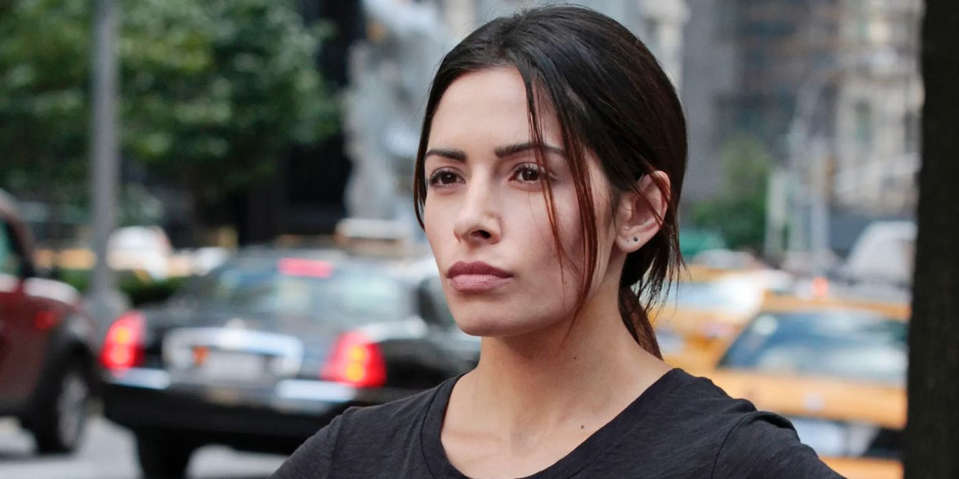 Sarah Shahi looking into the distance