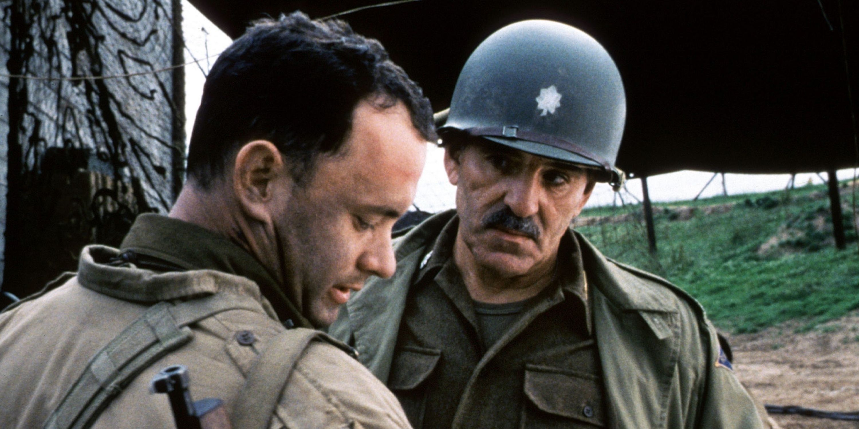 Tom Hanks as John H. Miller and Dennis Farina as Walter Anderson in Saving Private Ryan