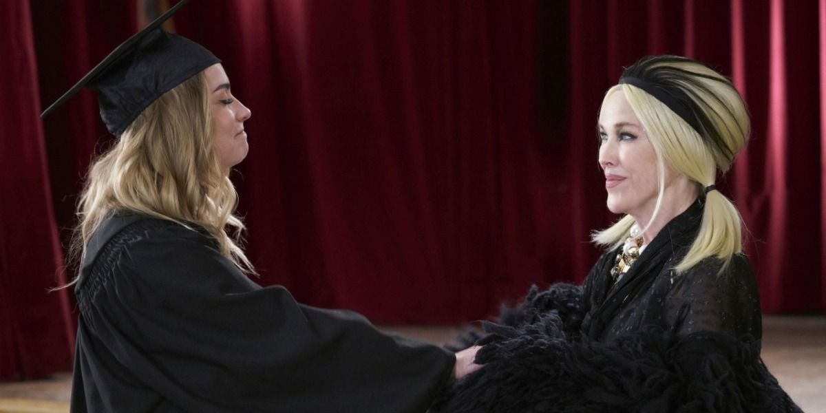 On Schitt's Creek, Alexis in her cap and gown with Moira who performed at the graduation