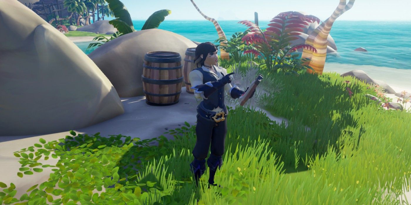 A pirate examines a map on an island in front of a barrel in Sea of Thieves