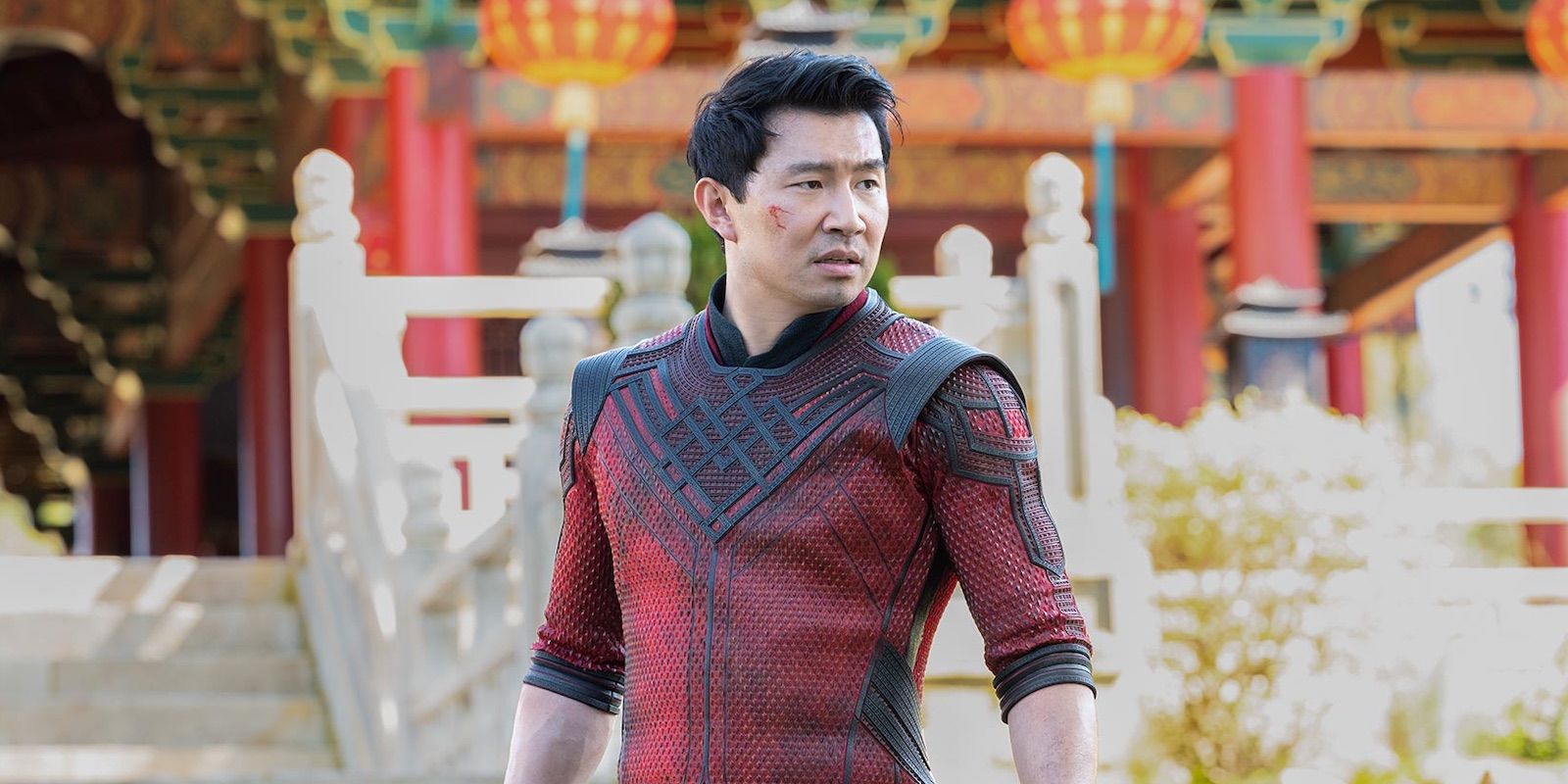 Simu Liu in costume outside a temple in Shang-Chi and the Legend of the Ten Rings