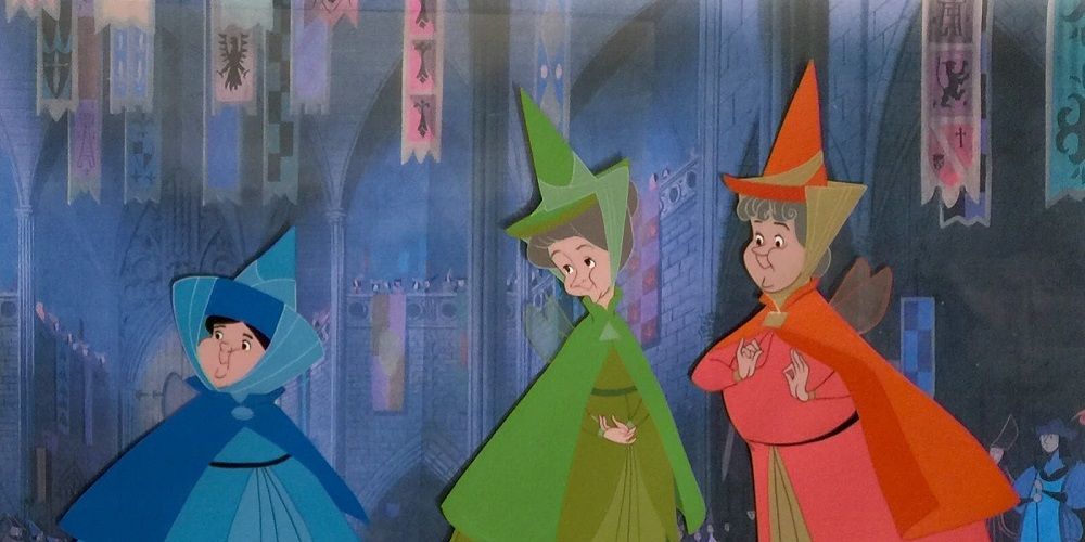 Flora, Fauna, and Merryweather gather in Sleeping Beauty