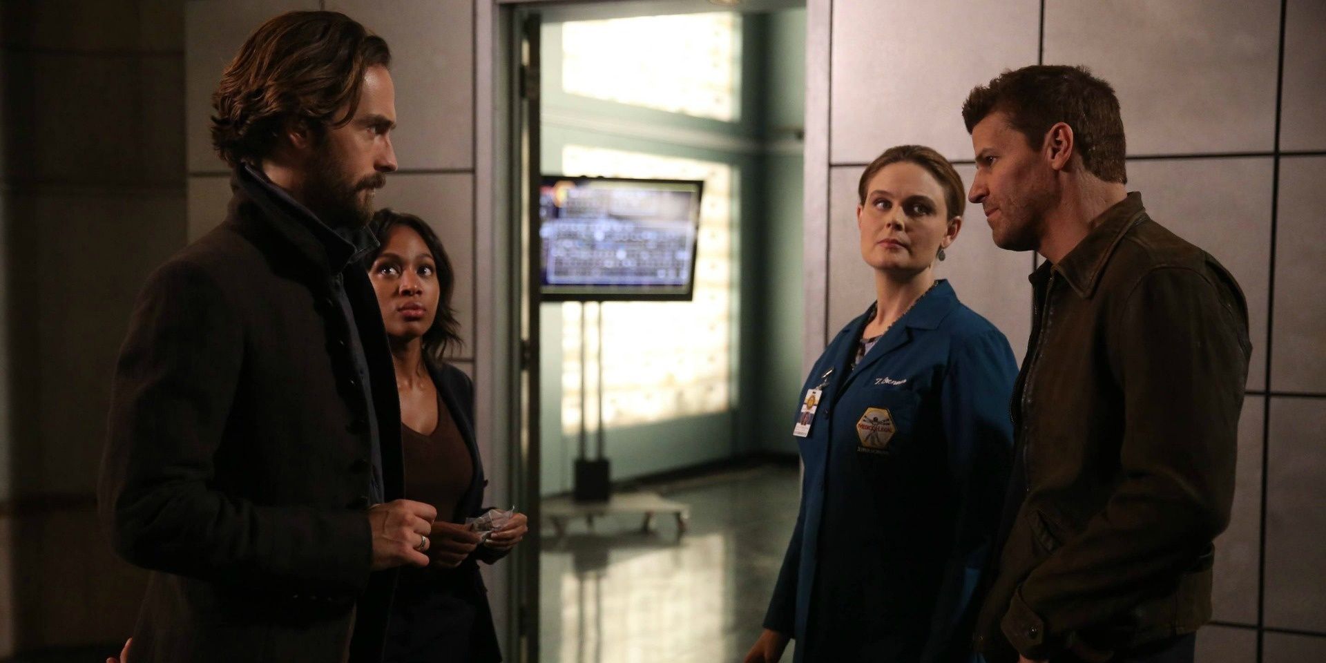 The casts of Sleepy Hollow and Bones stand in a hallway and talk
