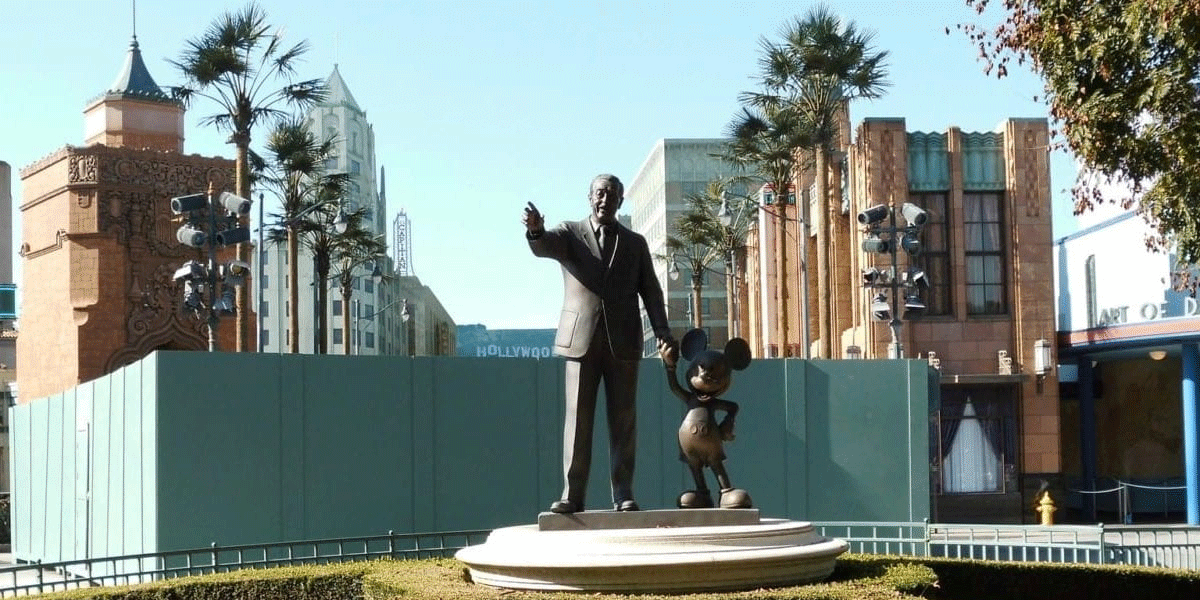 Statue of Walt Disney with Mickey in Go Away Green attraction