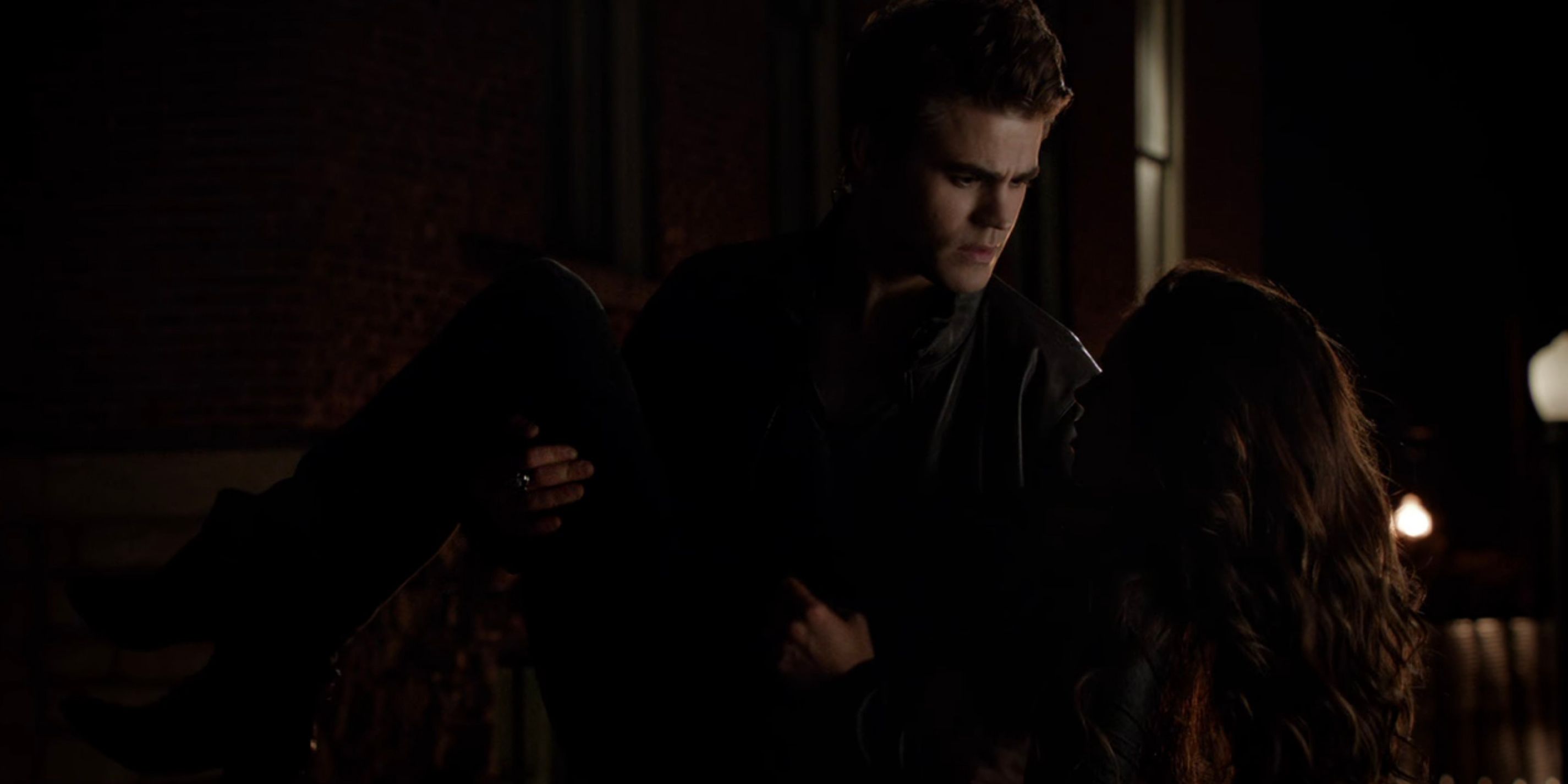 Stefan saves Katherine in The Vampire Diaries.