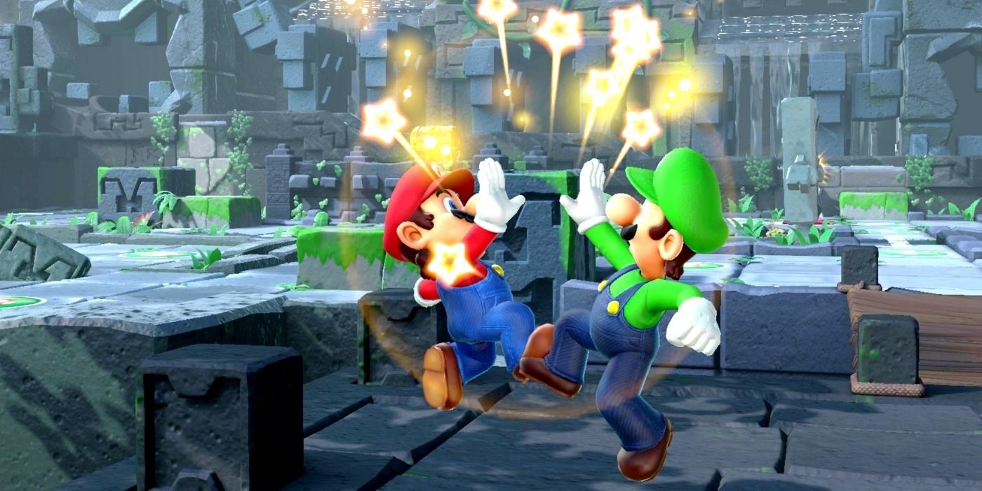 Mario and Luigi giving each other a high five in Super Mario Party.